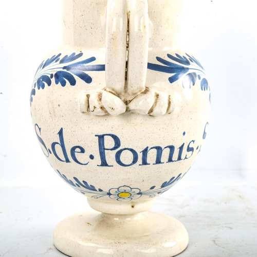 228 - A French tin-glazed pottery drugs ewer, with painted decoration, height 22cm