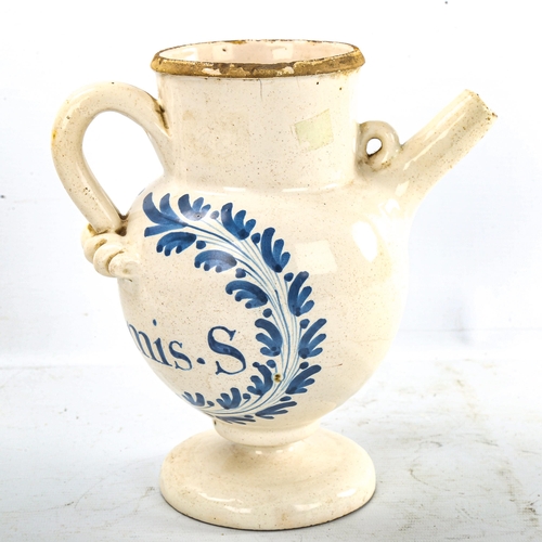 228 - A French tin-glazed pottery drugs ewer, with painted decoration, height 22cm