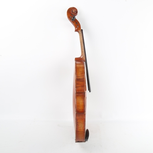 240 - An Antique violin, late 19th/early 20th century, retailed by London Violin Co Limited, bearing Strad... 