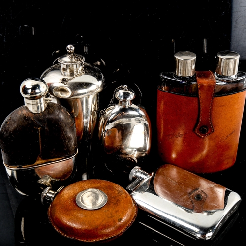 241 - A collection of hip flasks and spirit flasks, including some silver