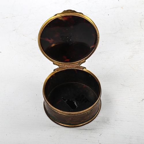 255 - An 18th century tortoiseshell and gilt-metal chinoiserie style box, diameter 7cm