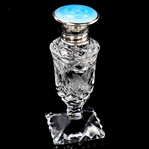 258 - A cut-glass silver and blue enamel topped perfume bottle, Birmingham 1929, height 9.5cm