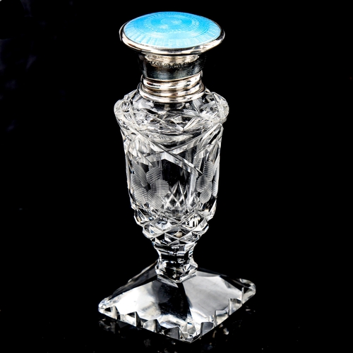 258 - A cut-glass silver and blue enamel topped perfume bottle, Birmingham 1929, height 9.5cm