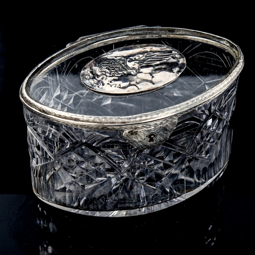 260 - A cut-glass and unmarked white metal mounted oval box, length 12cm, height 8cm