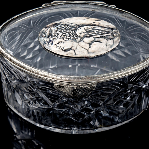 260 - A cut-glass and unmarked white metal mounted oval box, length 12cm, height 8cm