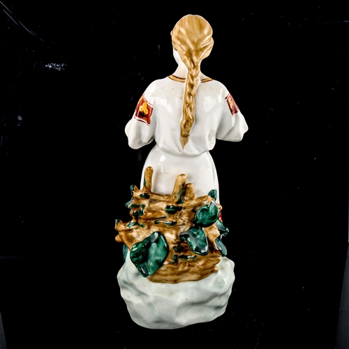 269 - A Russian porcelain figure of a girl, height 29cm