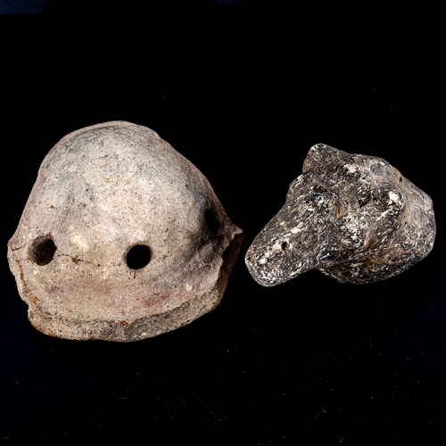 270 - An Ancient terracotta ocarina fragment with mask decoration, length 13cm, and a carved stone animal ... 