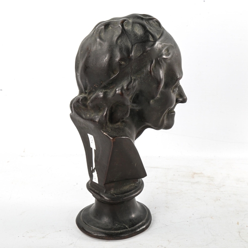 272 - A 19th century patinated bronze head and shoulders bust of Voltaire, unsigned, height 22cm