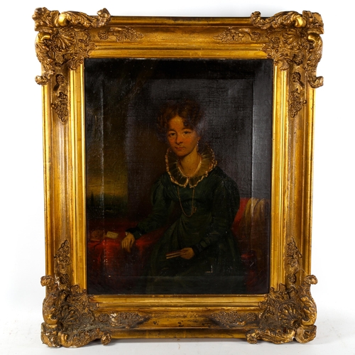 1417 - Mid-19th century oil on canvas, half length portrait of a woman, unsigned, 50cm x 40cm, framed