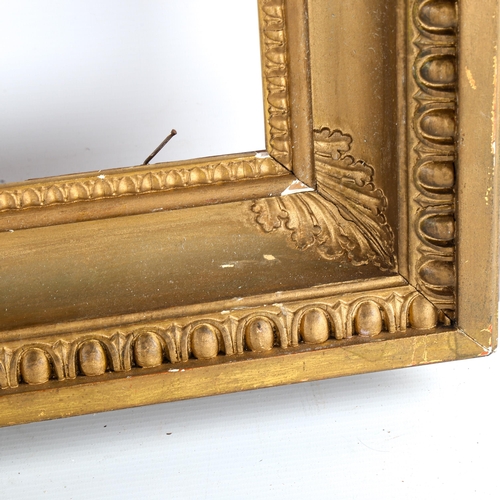 1479 - A Victorian gilt-gesso picture frame, rebate size 64cm x 85cm