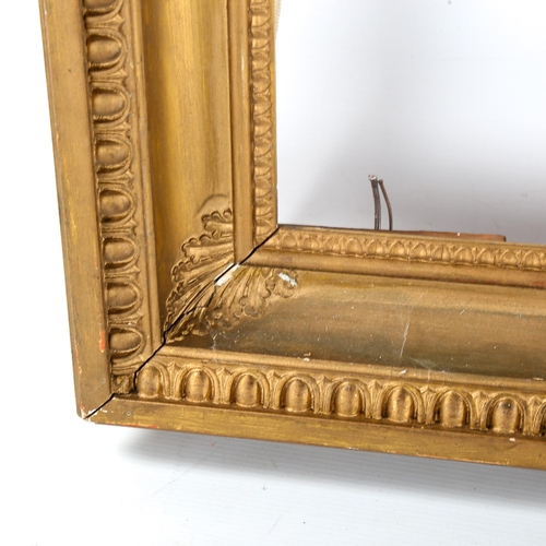 1479 - A Victorian gilt-gesso picture frame, rebate size 64cm x 85cm