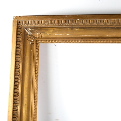 1479 - A Victorian gilt-gesso picture frame, rebate size 64cm x 85cm