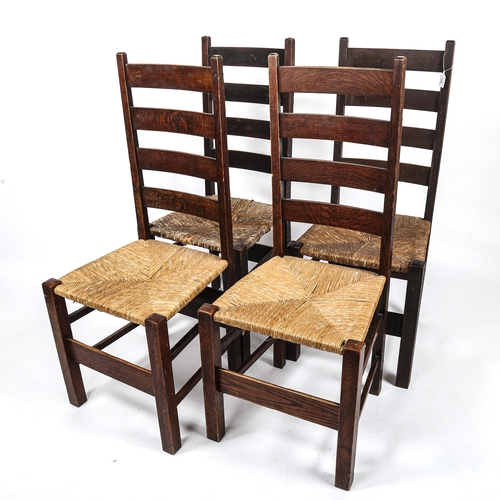 155 - A set of 4 Heals Letchworth Arts and Crafts Letchworth ladder-back dining chairs, with rush seats, c... 