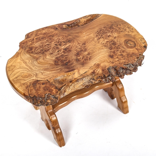 198 - In the manner of Alan Grainger (The Acorn Man), a small burr-elm low table on stretcher base, length... 