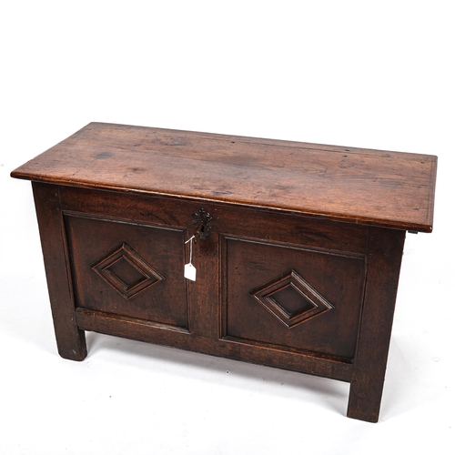 278 - An 18th century panelled oak blanket chest, length 105cm