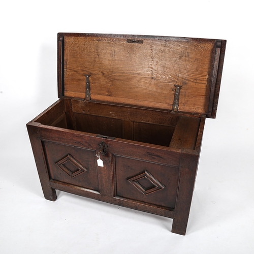 278 - An 18th century panelled oak blanket chest, length 105cm