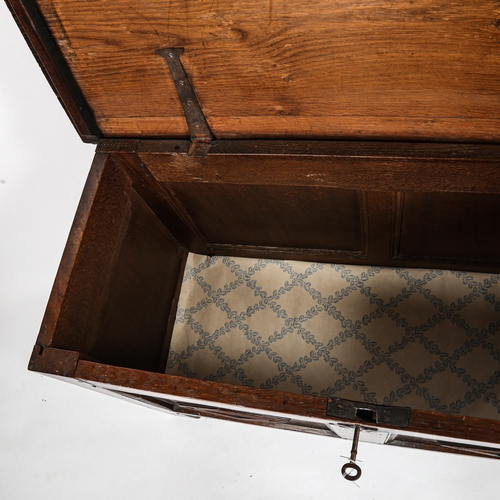 278 - An 18th century panelled oak blanket chest, length 105cm