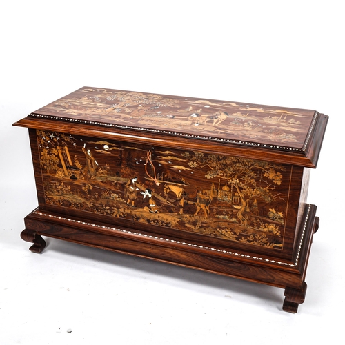 287 - An Anglo-Indian hardwood and bone inlaid chest, the lid and side panels inlaid with exotic woods dep... 