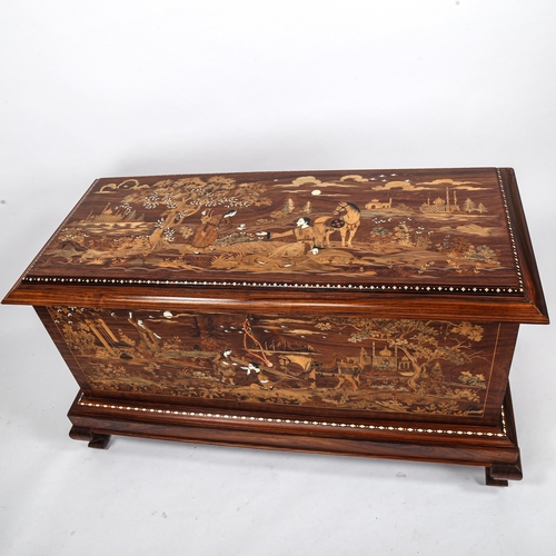 287 - An Anglo-Indian hardwood and bone inlaid chest, the lid and side panels inlaid with exotic woods dep... 