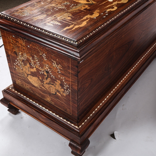 287 - An Anglo-Indian hardwood and bone inlaid chest, the lid and side panels inlaid with exotic woods dep... 