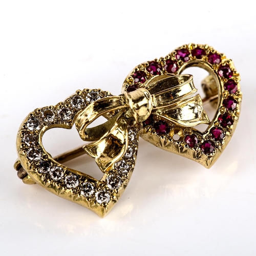 616 - A late 20th century 18ct gold ruby and diamond double-heart brooch, set with round-cut rubies and mo... 