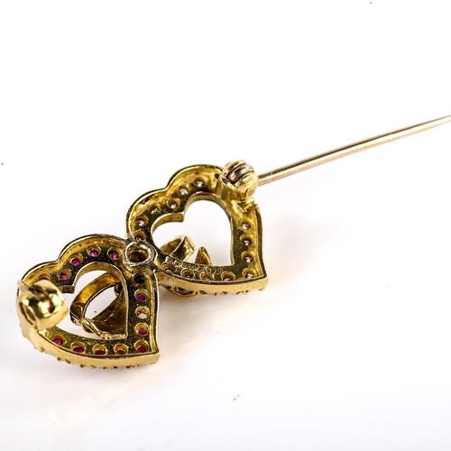 616 - A late 20th century 18ct gold ruby and diamond double-heart brooch, set with round-cut rubies and mo... 