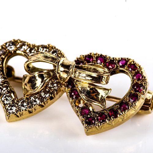 616 - A late 20th century 18ct gold ruby and diamond double-heart brooch, set with round-cut rubies and mo... 