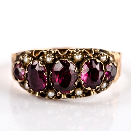 617 - A Victorian 9ct gold garnet and pearl half hoop ring, set with oval mixed-cut garnets and floral eng... 