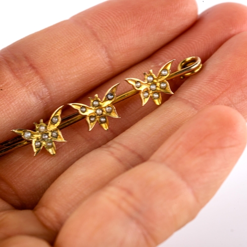 620 - A Victorian unmarked gold and split-pearl triple butterfly bar brooch, brooch length 44.6mm, 1.7g