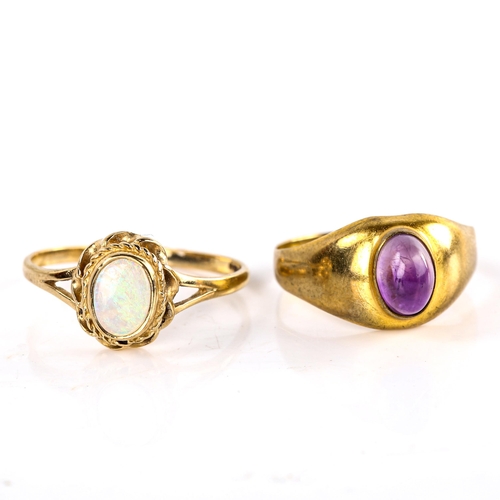 622 - A late 20th century 9ct gold cabochon opal dress ring, and an 8ct gold cabochon amethyst ring, sizes... 