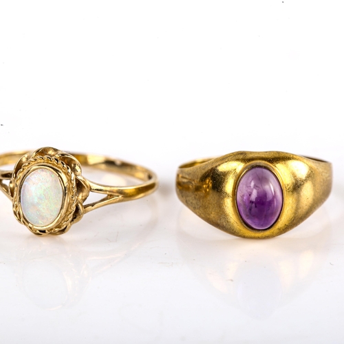 622 - A late 20th century 9ct gold cabochon opal dress ring, and an 8ct gold cabochon amethyst ring, sizes... 