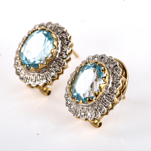 625 - A modern pair of 9ct gold blue topaz and diamond cluster earrings, with English lock fittings, setti... 