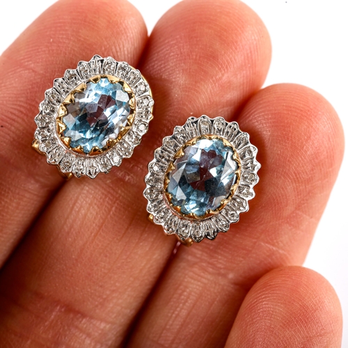 625 - A modern pair of 9ct gold blue topaz and diamond cluster earrings, with English lock fittings, setti... 