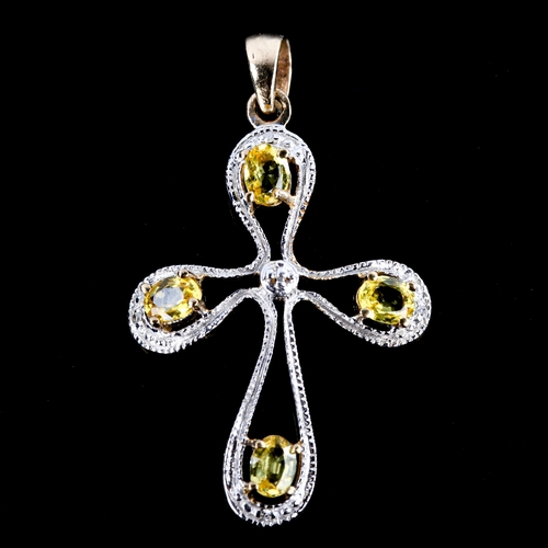 630 - A modern 9ct gold yellow apatite modernist cross pendant, pendant height excluding bale 29.8mm, 1.8g