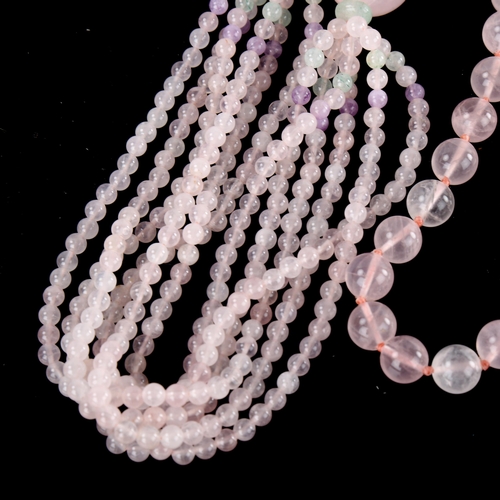 642 - A polished rose quartz jade and amethyst bead necklace, necklace length 76cm, 124.7g