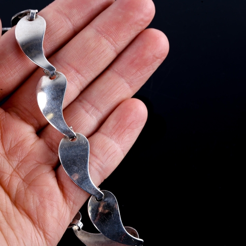 648 - HERMANN SIERSBOL - a Vintage Danish stylised sterling silver teardrop necklace, length 38cm, and a p... 