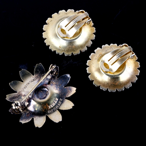 654 - BERNHARD HERTZ - a pair of Danish vermeil sterling silver and white enamel daisy pattern clip-on ear... 