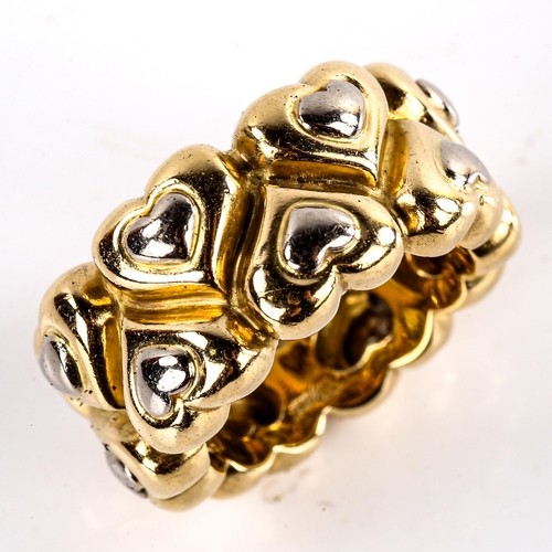 657 - CHOPARD - a heavy modern 18ct gold heart band ring, band width 11.2mm, size approx L, 17.5g, boxed w... 