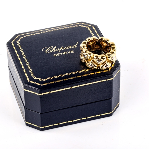 657 - CHOPARD - a heavy modern 18ct gold heart band ring, band width 11.2mm, size approx L, 17.5g, boxed w... 