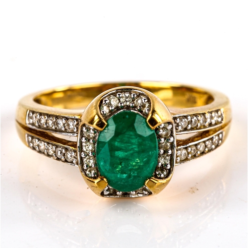 658 - A modern 18ct gold emerald and diamond halo cluster dress ring, by Iliana, set with oval mixed-cut e... 