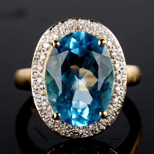 670 - A large modern 9ct gold blue topaz and diamond oval cluster ring, set with oval mixed-cut topaz and ... 