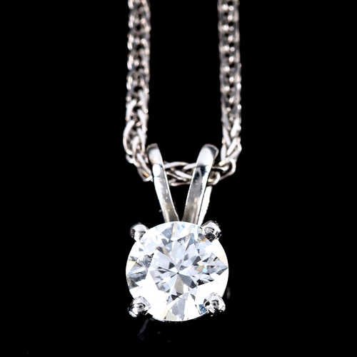 678 - A modern platinum 0.6ct solitaire diamond pendant necklace, on 18ct white gold trace link chain, dia... 