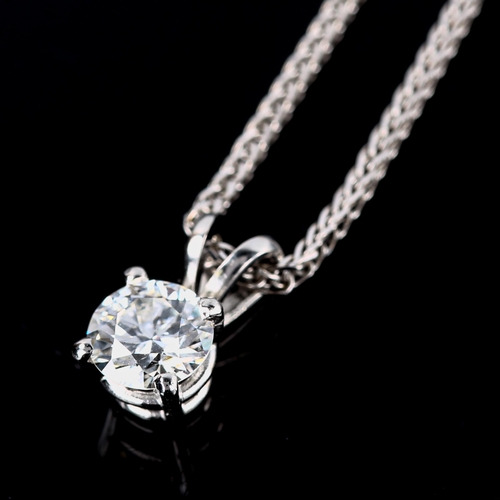 678 - A modern platinum 0.6ct solitaire diamond pendant necklace, on 18ct white gold trace link chain, dia... 