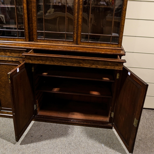 203 - A large fine George III plum pudding mahogany library bookcase, with 4 lattice glazed cabinets above... 