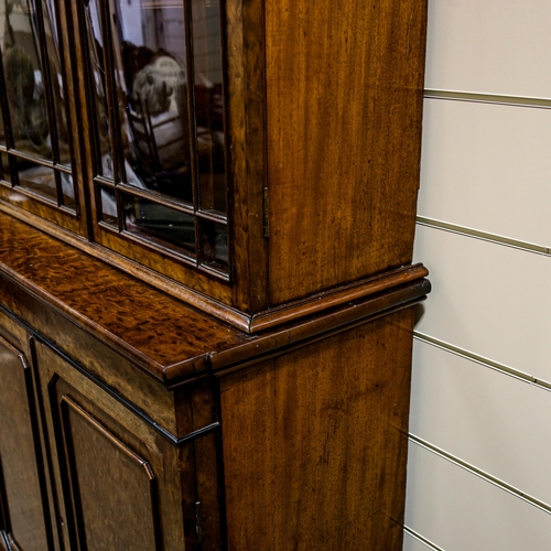 203 - A large fine George III plum pudding mahogany library bookcase, with 4 lattice glazed cabinets above... 