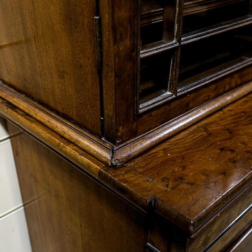 203 - A large fine George III plum pudding mahogany library bookcase, with 4 lattice glazed cabinets above... 