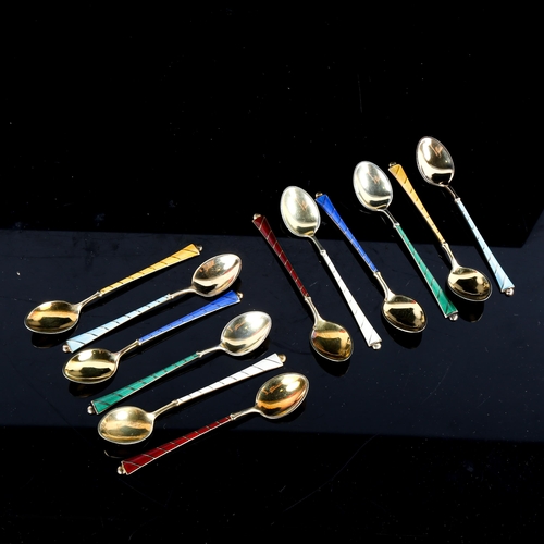 697 - EGON LAURIDSEN - a set of 12 Danish vermeil sterling silver and harlequin enamel coffee spoons, leng... 