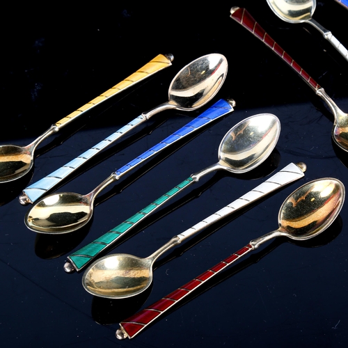 697 - EGON LAURIDSEN - a set of 12 Danish vermeil sterling silver and harlequin enamel coffee spoons, leng... 