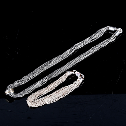 705 - RICHARD AARBOE - a Danish sterling silver multi-link hoop pendant necklace, and a similar bracelet, ... 