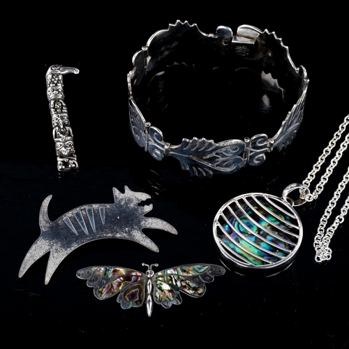 708 - Various Mexican sterling silver jewellery, including panel bracelet, figural brooches etc, 64.8g tot... 